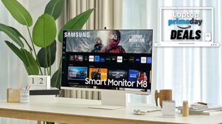 Samsung M8 Smart Monitor lifestyle photo in a well lit room, Laptop Mag Prime Day deals badge in top right corner.