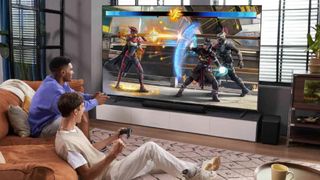 Best TV deals Two men playing a fighting game on an LCD TV